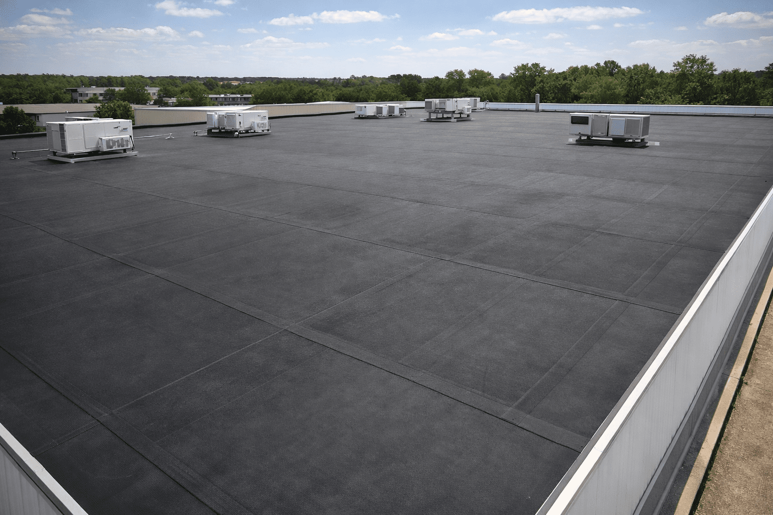 EPDM rubber roofing system installed on a flat commercial roof