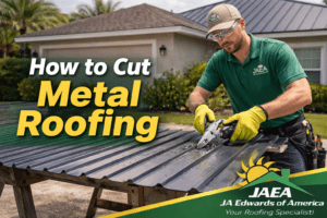 Cutting a metal roofing panel on sawhorses outside a Florida home with safety gloves and eye protection