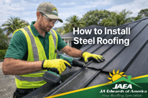 Roofing contractor installing steel panels on a Florida home roof wearing safety gear and green and yellow work clothing