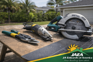 Metal roofing cutting tools laid out on a work table including tin snips, electric shears, and a circular saw with a metal-cutting blade