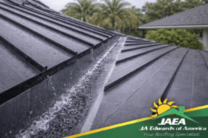 Clean steel roofing flashing installed in a roof valley to guide water away during heavy Florida rain.