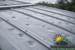 metal roof with hail damage
