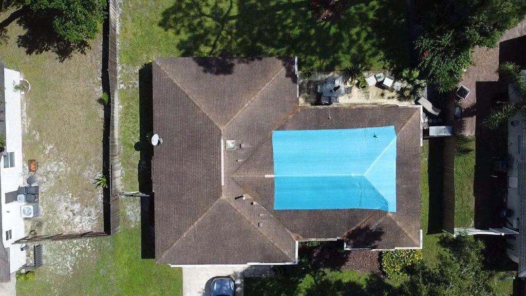 1. Tarp areal image by JA Edwards of America Roofing, Roofing contractor Orlando-FL, Roofing Company Orlando-FL, Residential Roofing Orlando-FL