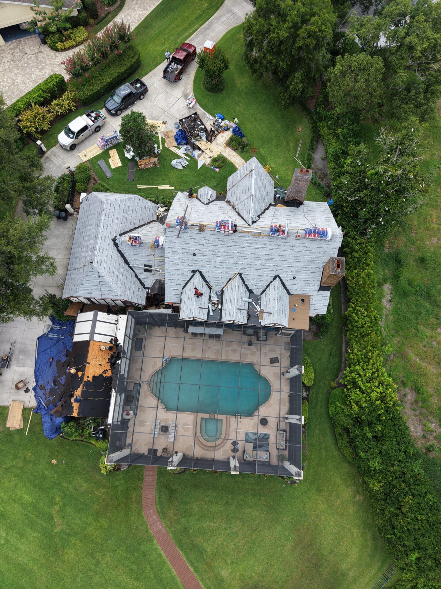 Synthetic underlayment and dry in layer installed on a Port St. Lucie roof before shingles