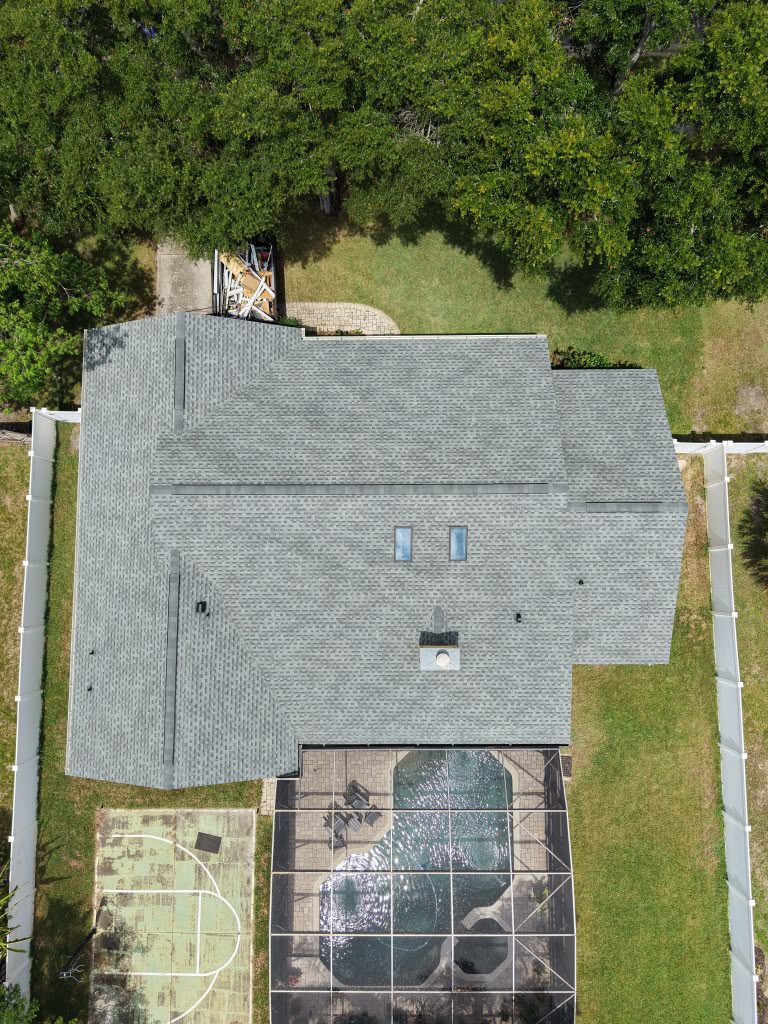 Aerial view of a Florida shingle roof showing roof vents and the overall roofline
